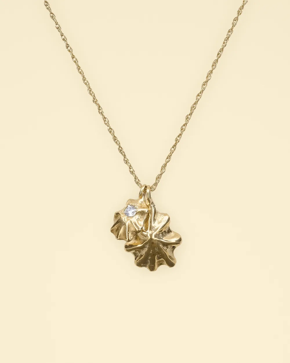Star Limpet pendant, two gold limpet shells with a diamond, on a fine chain