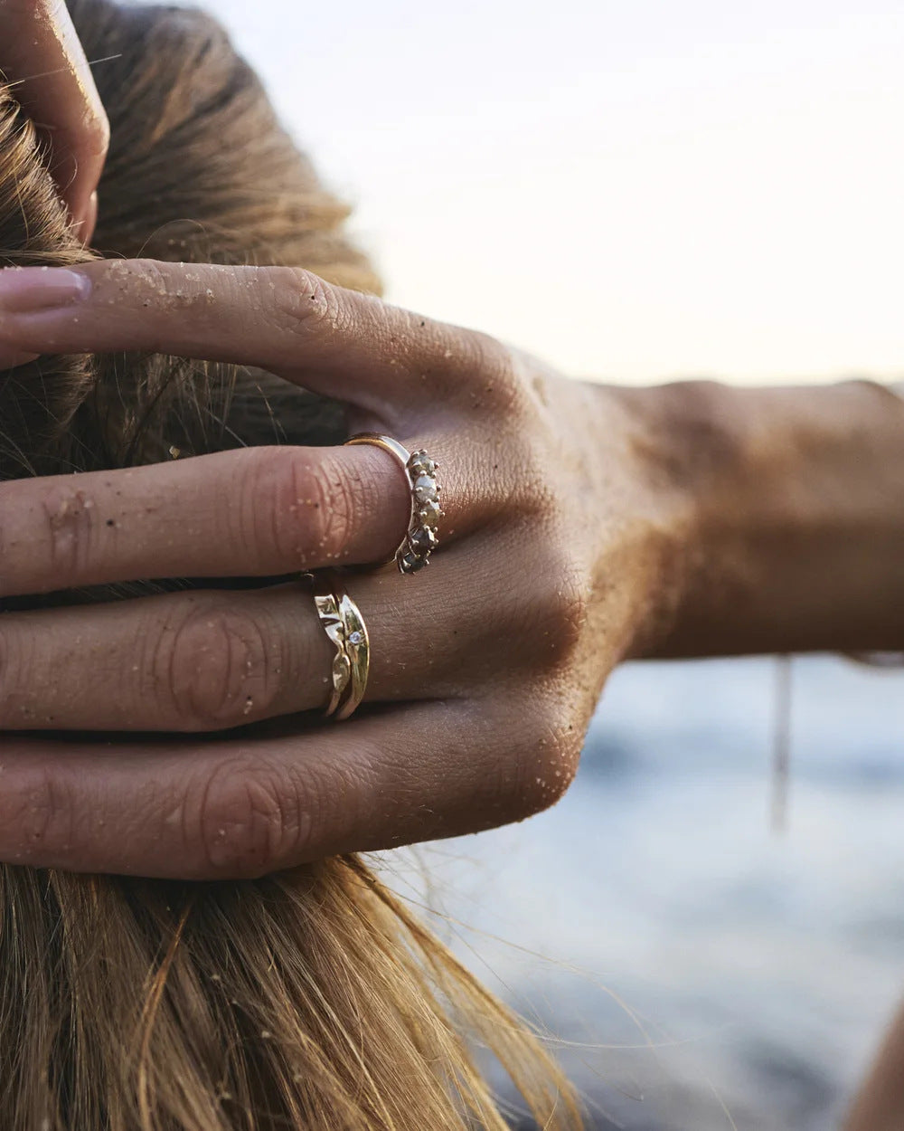 Rose cut star ring worn on the index finger at sunset